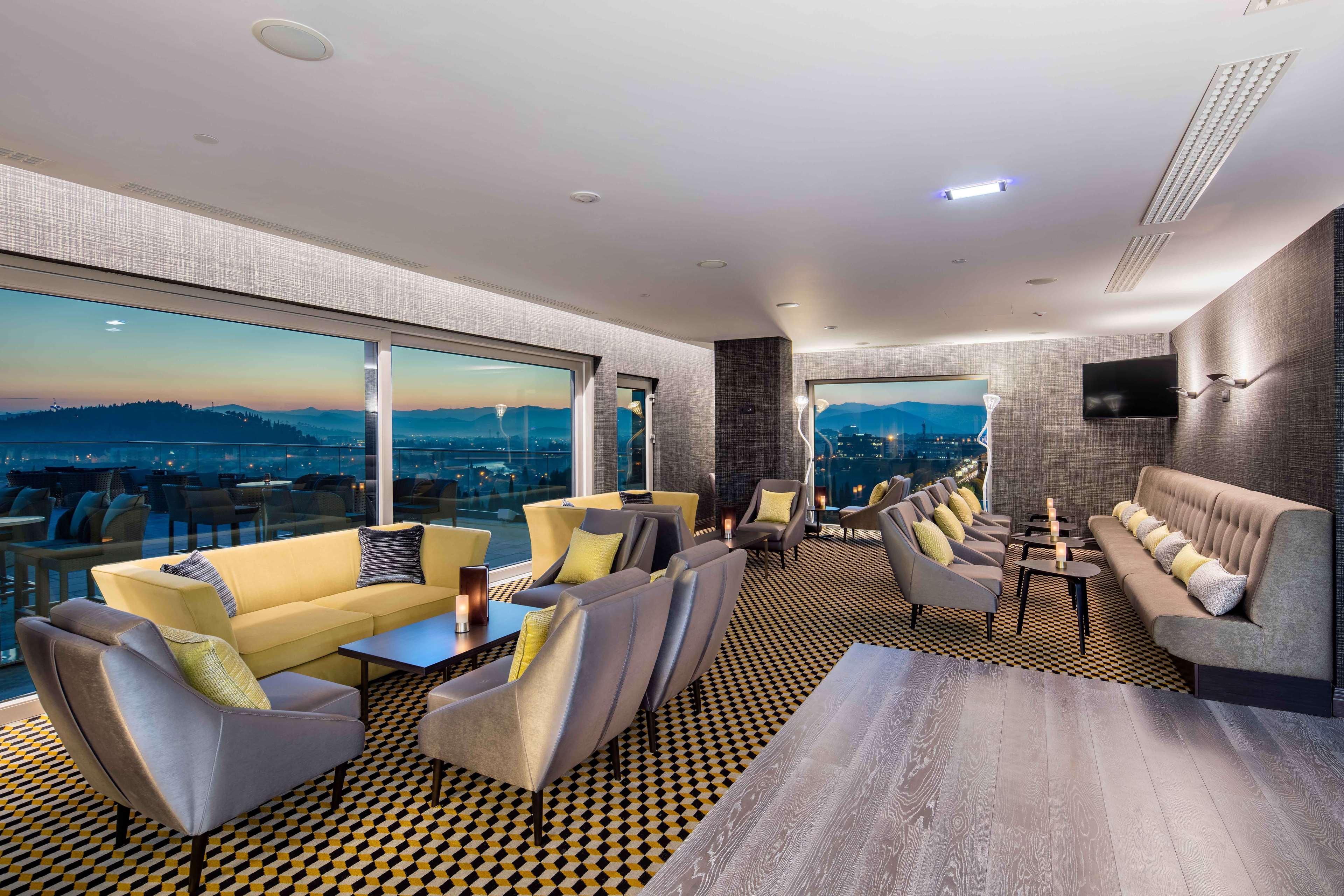 Hilton Podgorica Crna Gora Hotel Exterior photo The 19th Lounge at the airport